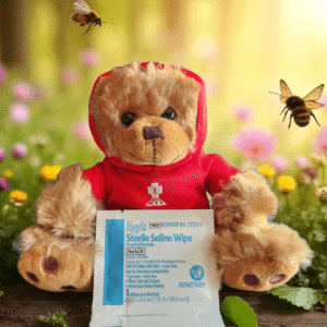 Teddy bear with saline wipe in garden.